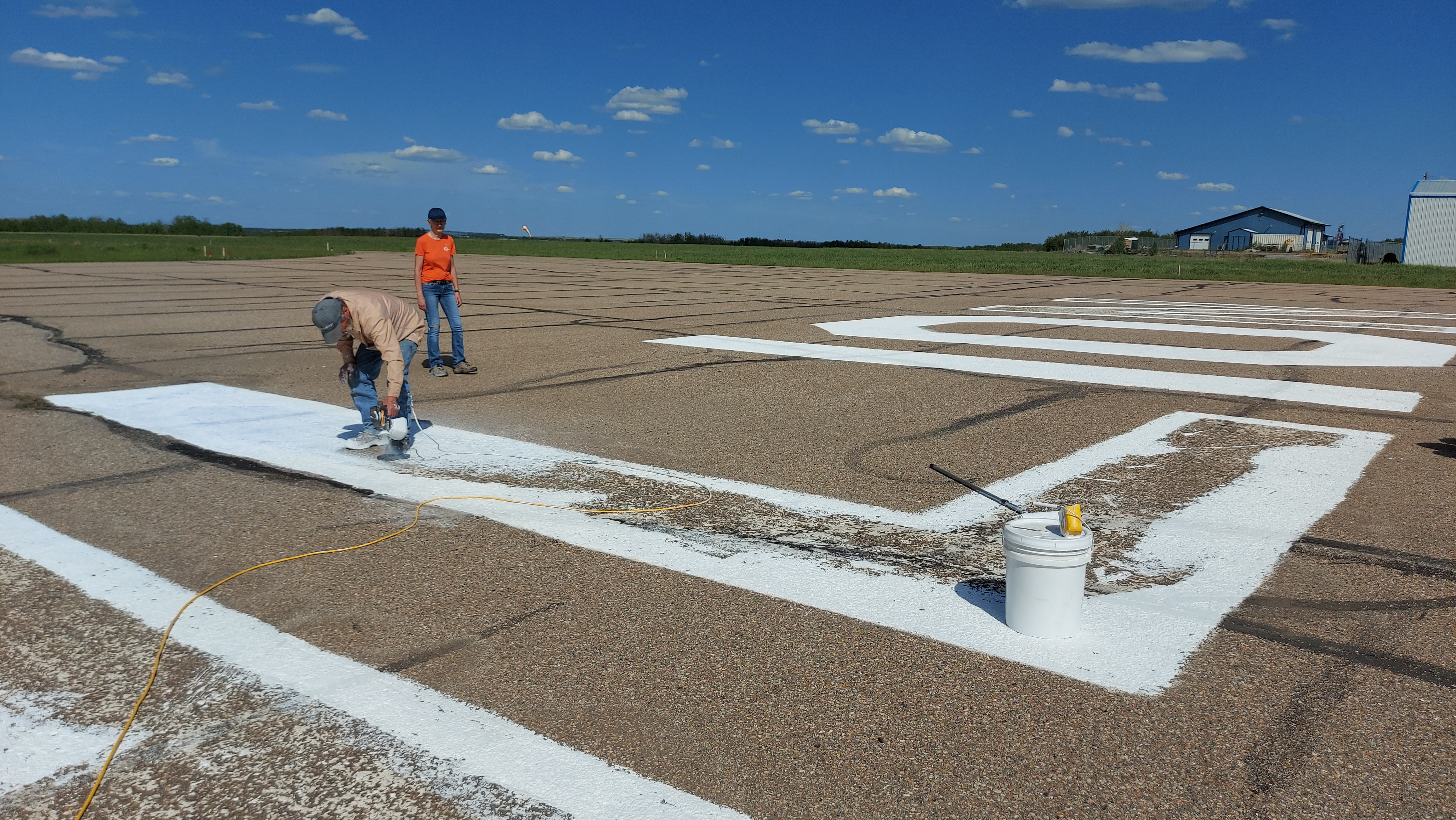 Painting The Airport Lettering – Fly YVG
